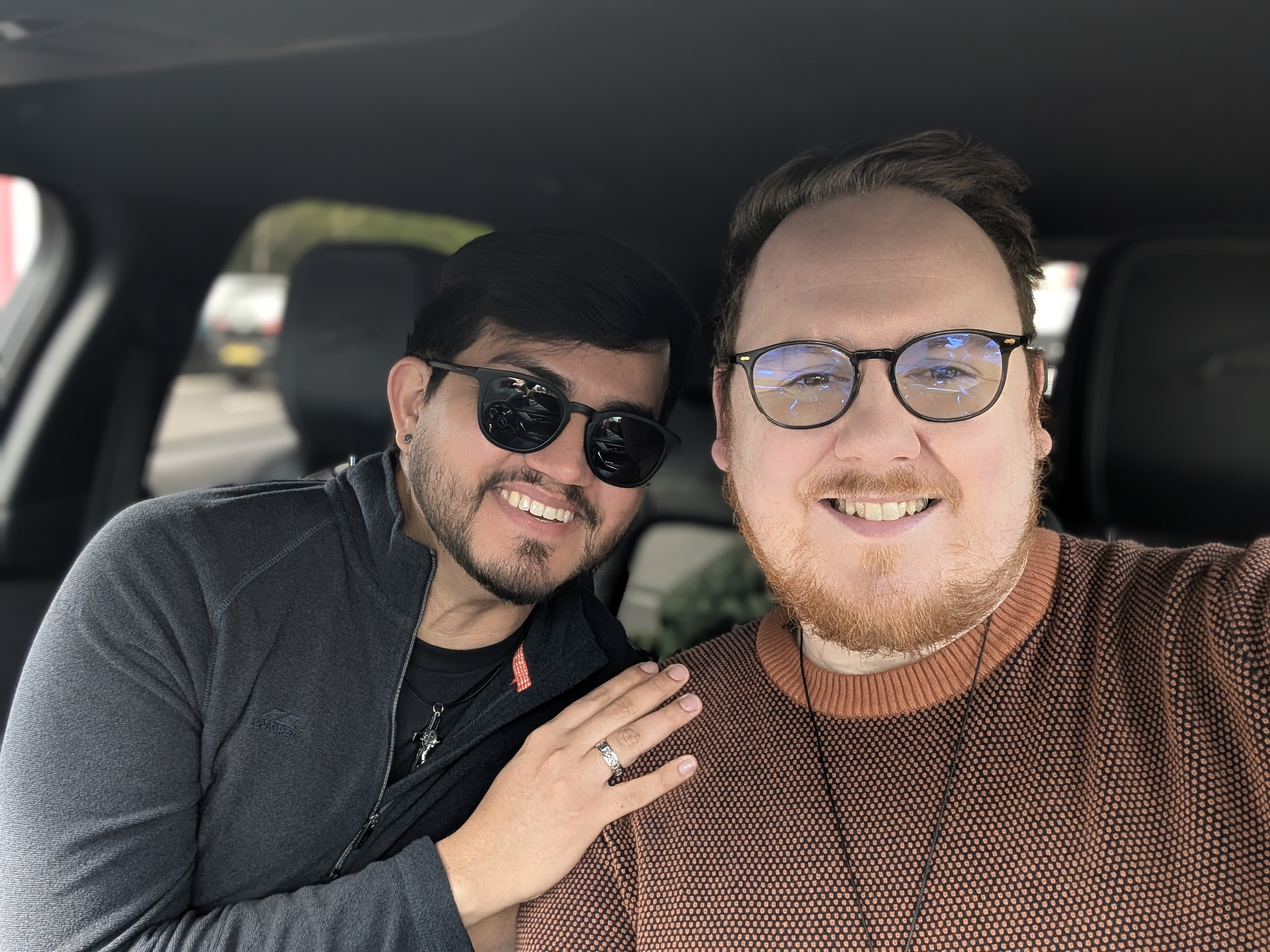 Seamus and Gilberto showing off rings